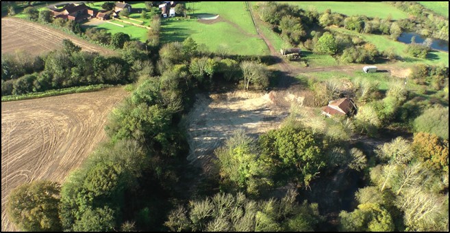 The former bungalow and disused lime works