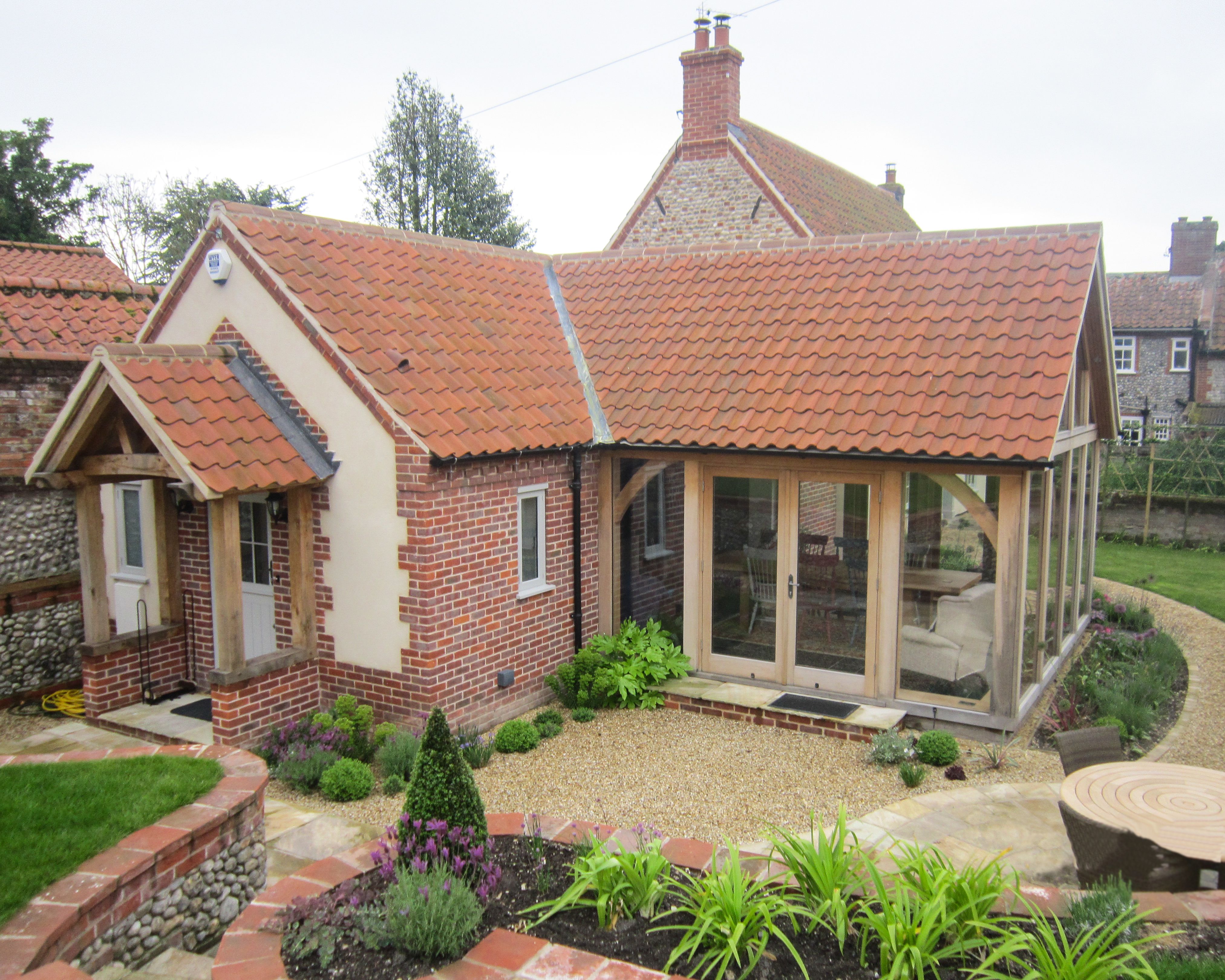 Linked extension part timber framed