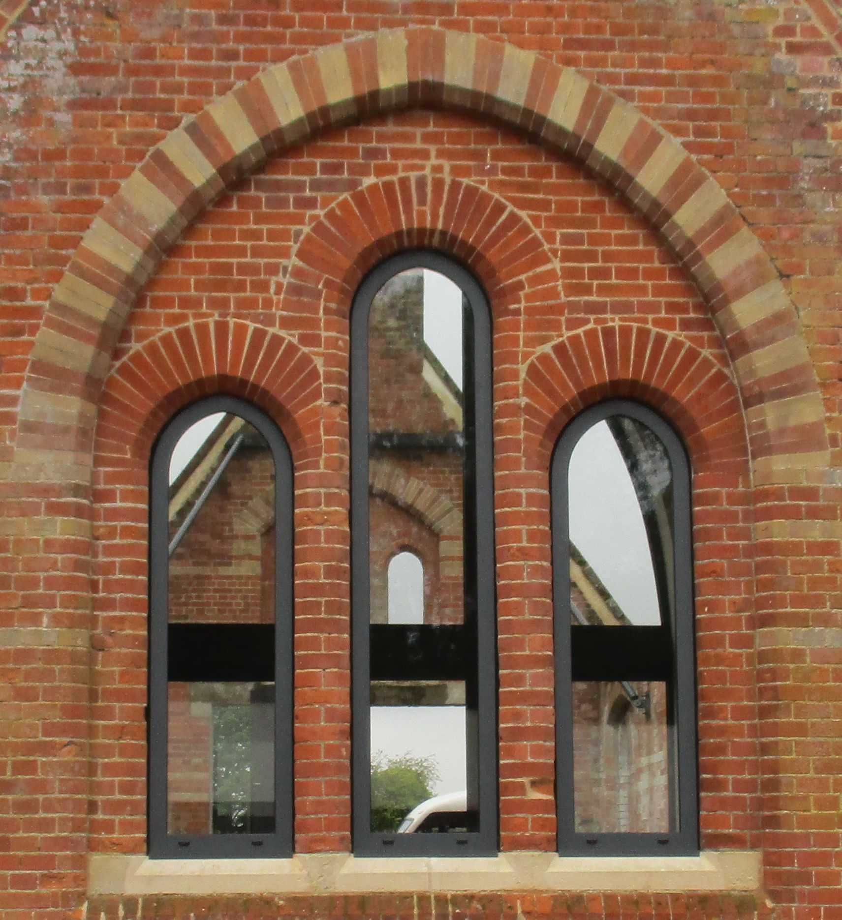 Feature aluminium windows in historic opening